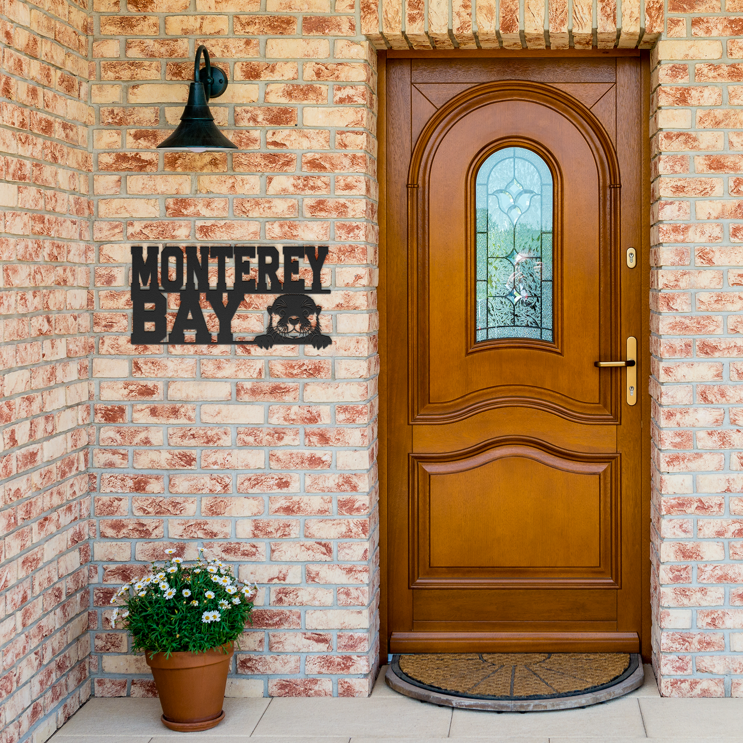 Monterey_Bay_Otter_Metal_Wall_Art__Cu_Black_Brick_Entrance_Mockup.png